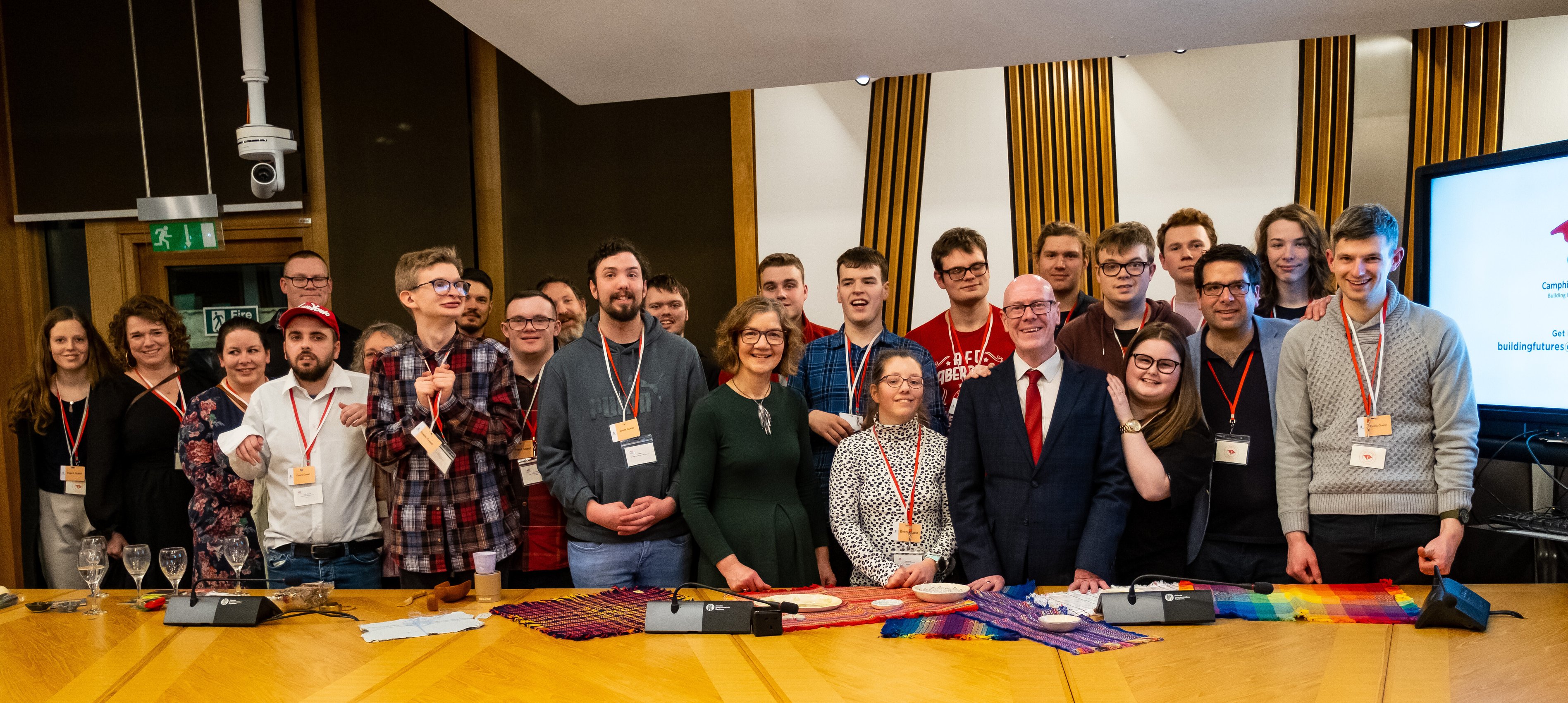 Camphill Exec Director Alex Busch, staff and residents with Scottish Minister Kevin Stewart